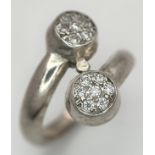 An Impressive and Unusual Crossover SILVER RING, having SPARKLING ZIRCONIAS CLUSTER SET in COLETTE
