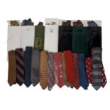 23 Designer Silk Ties. Some in original packaging. All in good condition. Includes: YSL, Givenchy,