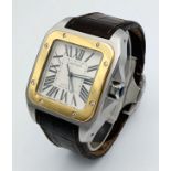 A Vintage Cartier Santos 100 Automatic Gents Watch. Brown leather strap with Cartier Stainless steel