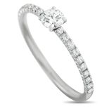 A Cartier Etincelle Platinum 0.21ct Diamond Ring. The Platinum setting features a 0.21-carat GIA-
