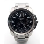 A Cartier Calibre de Cartier Automatic Gents Watch. Model W7100016. Stainless steel bracelet and