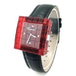 A Chopard 'Be Mad' Limited Edition Quartz Ladies Watch. Black leather strap. Burgundy translucent