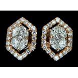 A Pair of 18K Rose Gold Hexagonal Diamond Stud Earrings. Marquise cut centre diamonds with round