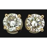 A Pair of 18K Yellow Gold and Diamond Stud Earrings. 0.80ctw of round brilliant cut diamonds