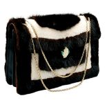 A Bvlgari Serpenti Fur and Leather Shoulder Bag. Contrasting black and cream fur exterior with