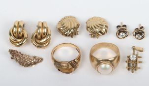 A 14ct ring with yellow stone (5.6g), two pairs of 9ct earrings (8.31g), a 9ct pearl ring (5.12g),