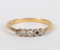 An 18ct five stone diamond ring, one stone missing, 2.65g