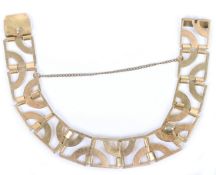 An 18ct gold bracelet, twelve square links with safety chain, 39.14g