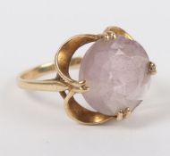 A pretty 9ct gold rose quartz ring, the stone 10mm, total weight 2.9g