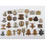 Grouping of mainly British Military Badges.