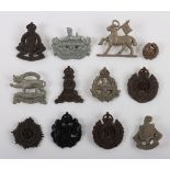 Grouping of WW2 Plastic Economy Cap Badges.