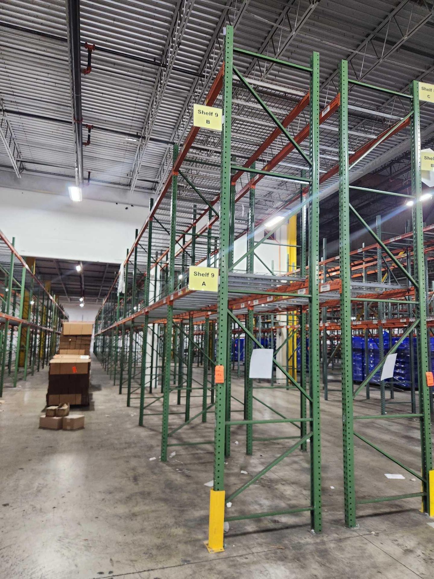 Lot of (22) sections of teardrop pallet racking consists of (10) 16 ft ...