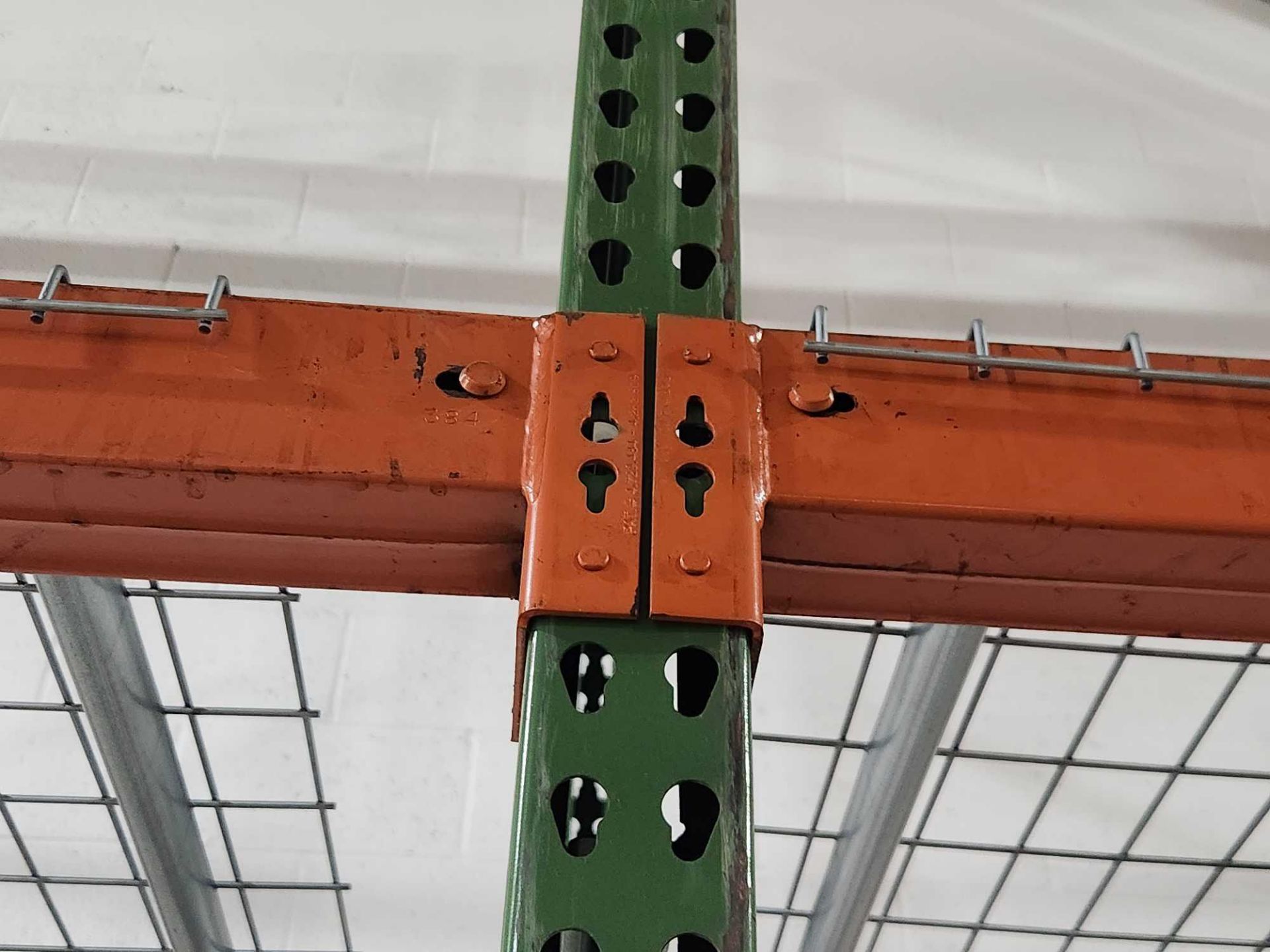 Lot of (22) sections of teardrop pallet racking consists of (23) 16 ft ...