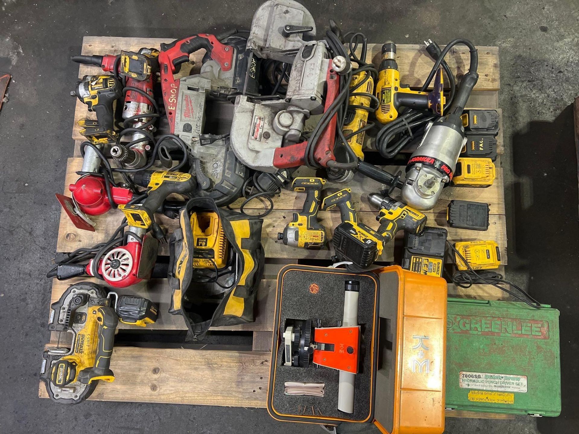 Lot of assorted power tools, horizontal band saws. Right angle grinders ...