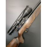 An Air Arms SM-100 .22 air rifle, C0035, with a Hawke scope, 93 cm overall    Provenance: The