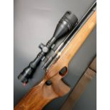 A Falcon FN12TW .177 air rifle, 80955, with a Tasco scope, 95 cm overall    Provenance: The property