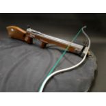 A crossbow, in a soft case    Provenance: The property of a lifetime collector and airgun