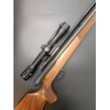 A Titan Mohawk .22 air rifle, with a scope, 104 cm overall    Provenance: The property of a lifetime
