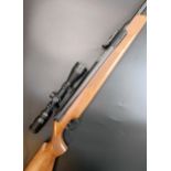 A Diana model 52 .22 air rifle, 925425, with a Hawke scope, 111 cm overall    Provenance: The