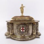 A silver gilt and enamel presentation casket, of shaped oval form, 'Presented to Alderman Thomas