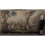 A large 18th/19th century French tapestry, decorated classical figures in a landscape, 240 x 398 cm