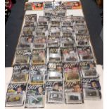 A collection of The Official James Bond Car Collection 007 magazines, with model cars (box)  Note:
