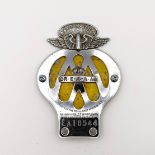 An AA chrome plated East Africa motorcycle badge, No EA18544, and applied REAAA under a crown badge,