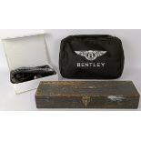 A group of new old stock and other items, including Wipac Quadoptic headlamps, a Bentley GTC car