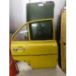Two Ford Escort Mk 1 boot lids, and a rear door