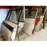 Seven Ford doors, including Cortina Mk I Collection from DT2 0PR will be on auction day until 4.00pm