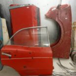 Four Ford Cortina Mk III boot lids, a door, a  Cortina Mk IV wing, and a Cortina Mk IV wing
