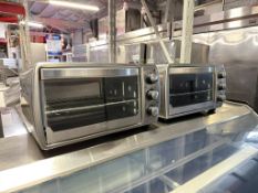 Oster, OSRTSSTTVCGBK, 6-slice Convection Toaster Oven, Silver