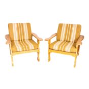 In the Manner of Henning Kjærnulf (Danish, 20th Century) Pair of Armchairs