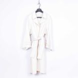 An Yves Saint Laurent white cashmere coat
