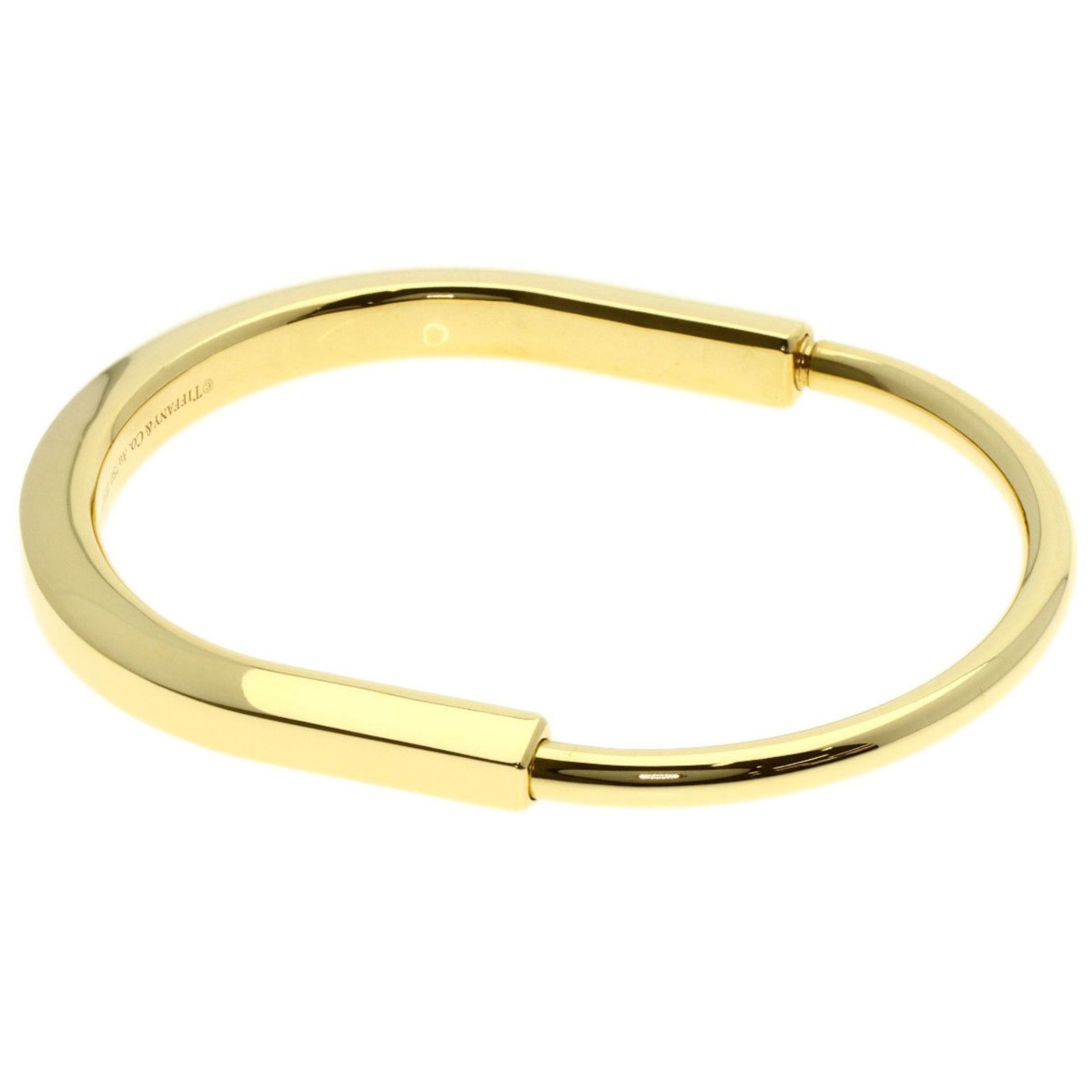Tiffany Lock Bangle Bracelet in 18K Yellow Gold for Women. TIFFANY & Co.