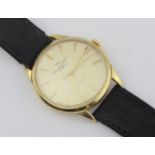 An IWC (International Watch Co) 18ct gold cased wristwatch with automatic movement, silvered dial,
