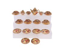 A Royal Worcester Orchard pattern porcelain miniature six-person tea service by William Roberts,