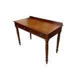 A Victorian Heal & Son mahogany side table with two frieze drawers, on turned legs, 107cms wide.