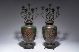 A pair of Japanese cloisonné vases with French partly gilt bronze chinoiserie candelabra mounts
