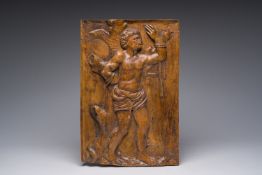 A carved wooden relief with Saint Sebastian, probably Southern Europe, 17th C.