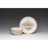 A Chinese famille rose 'flower basket' cup and saucer, Qianlong