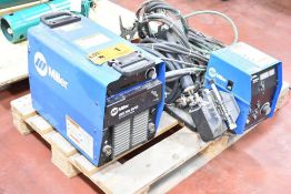 MILLER XMT 304 CC/CV DIGITAL MIG WELDER WITH MILLER WIRE FEED, CABLES AND GUN, S/N KK175466 (LOCATED