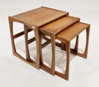Mid-20th century G-Plan Quadrille nest of three teak occasional tables, largest 49cm high x 54cm