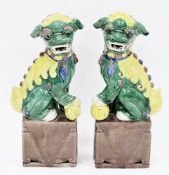 Pair of contemporary Chinese porcelain Kangxi-style models of lion dogs, printed and impressed