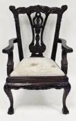 Mahogany doll's elbow chair in the Chippendale manner with pierced carved splat, scrolling arms