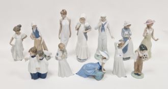 Twelve Nao porcelain figures, printed and impressed marks, including: a sailor, a boy with a