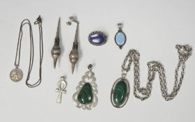 Silver hallmarked pendant set with a polished malachite stone, 7cm long, a white metal oval