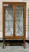 1930's/40's oak display cabinet, the Art Deco design astragal-glazed twin doors opening to three