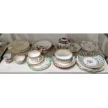 Pair of Derby saucer-dishes and a slop-bowl, circa 1825, iron-red crowned crossed batons, D &