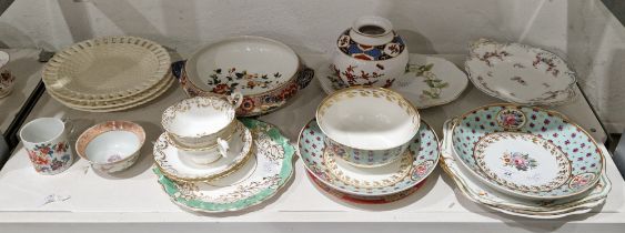 Pair of Derby saucer-dishes and a slop-bowl, circa 1825, iron-red crowned crossed batons, D &